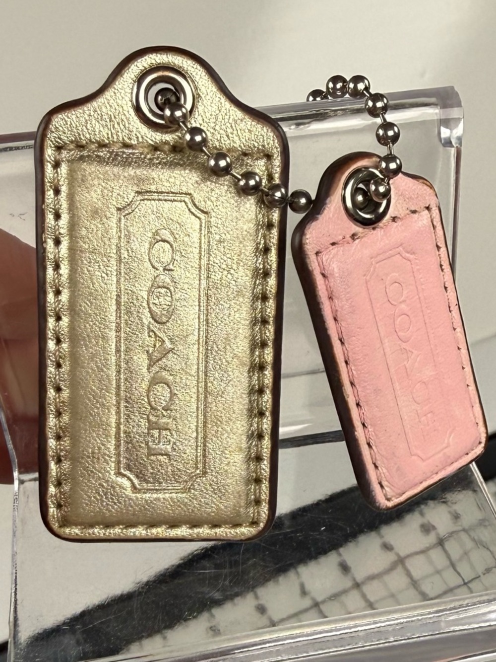 COACH Gold and Blush Leather Tag Key Fob Set